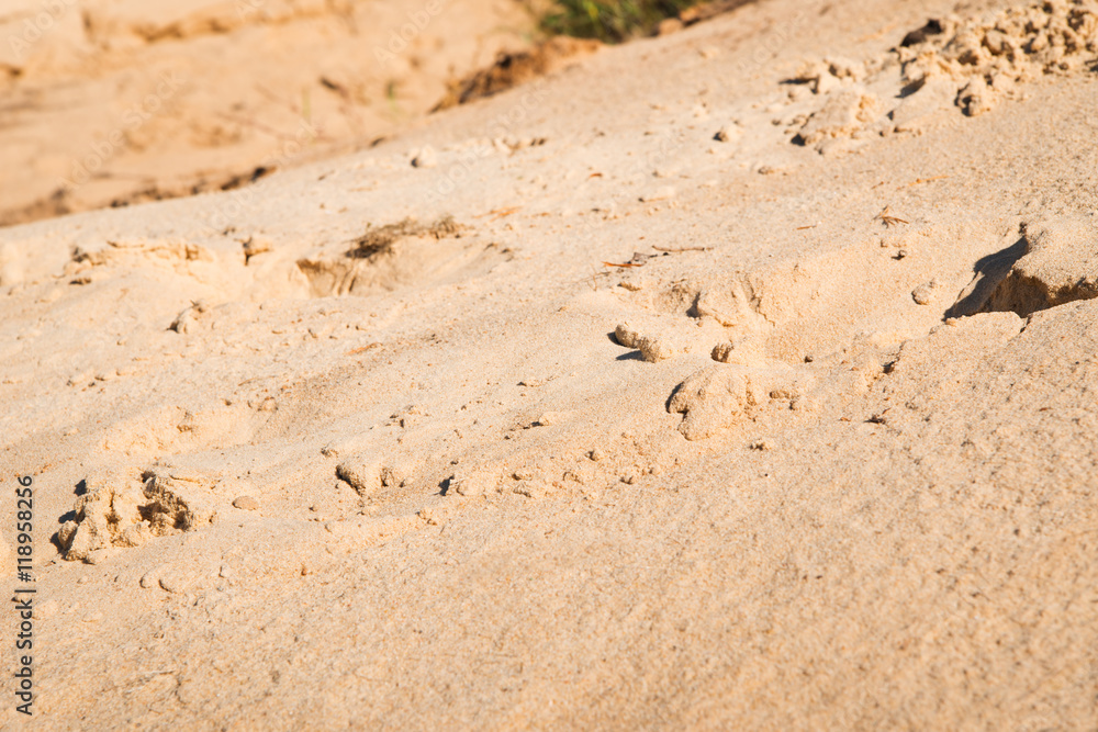 sand on a beach near a sea sand on a beach near a sea