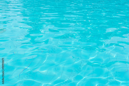 blue swimming pool with sunny reflections © CasanoWa Stutio