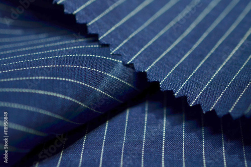 close up dark blue fabric of suit