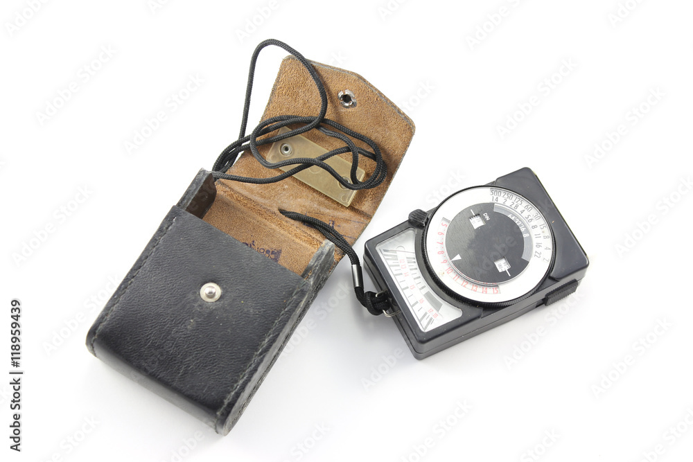 Old light meter on a white background Old light meter on a white background