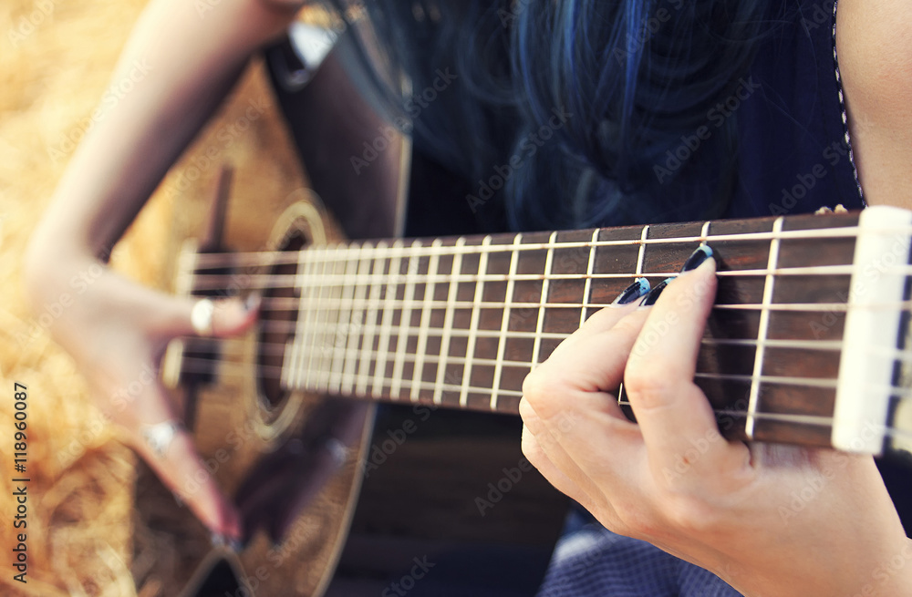 Obraz premium Tocando la guitarra 