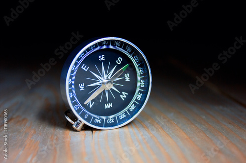 Compass in the wooden table