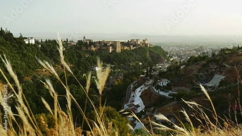 Beautiful view of Granada city in Spain with a famous alhambra tourist attraction on a hill