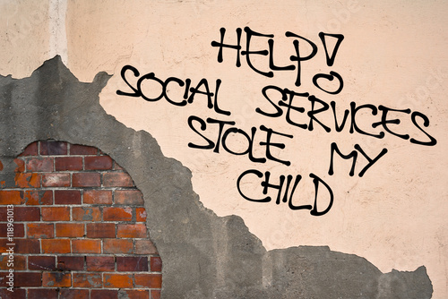 Fotografie Help! Social Service Stole My Child - handwritten graffiti sprayed on the wall -
