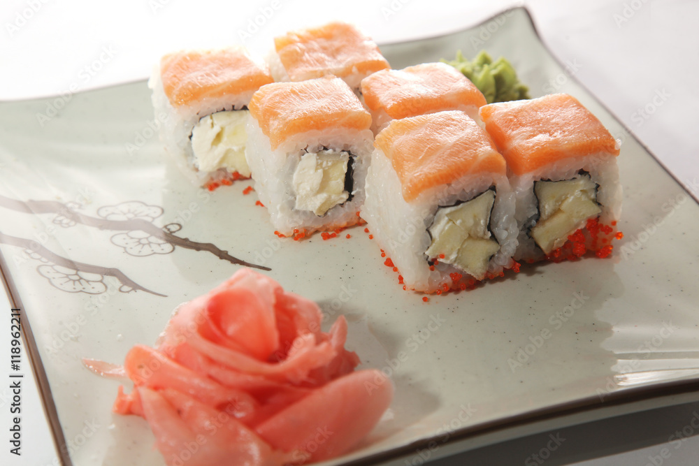 Japanese roll with wasabi sauce on plate Japanese roll with wasabi sauce on plate