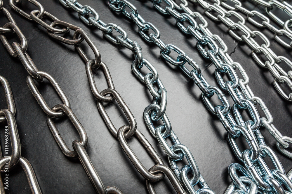 Fototapeta premium chains on a black background