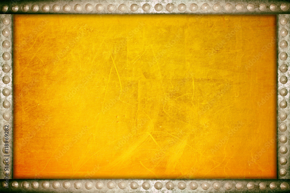Scratches on a metallic gold background with metal rivets frame Scratches on a metallic gold background with metal rivets frame