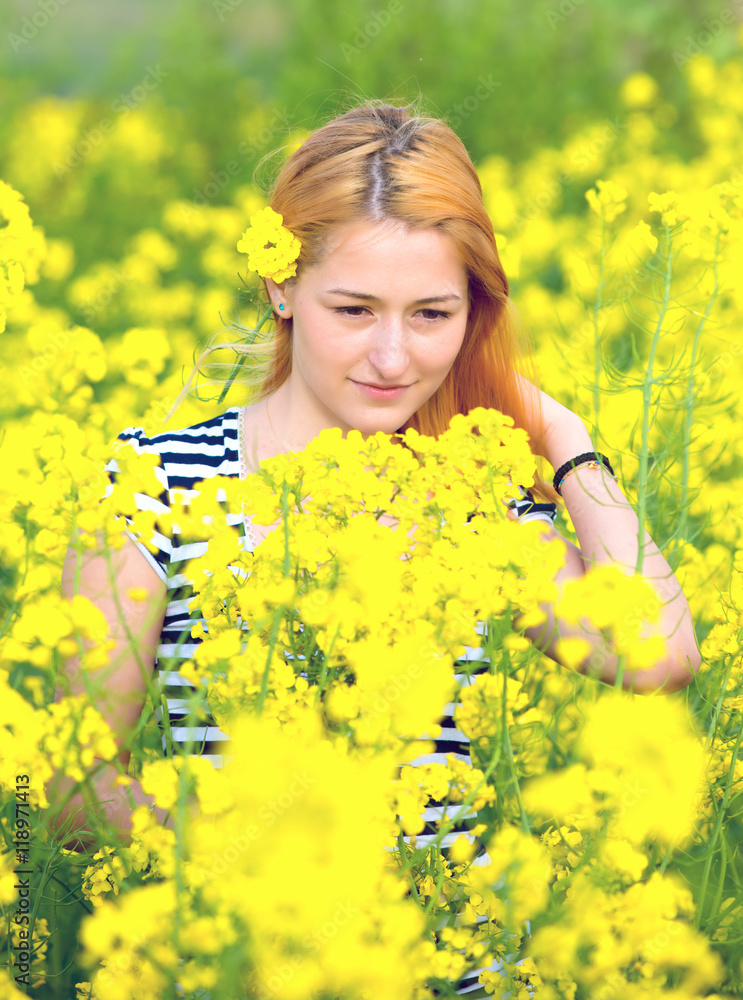 portrait of a beautiful girl in the colza field portrait of a beautiful girl in the colza field