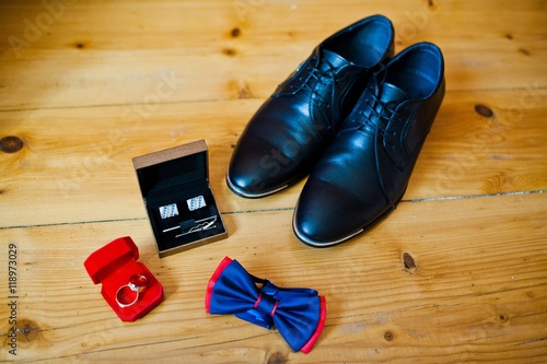 Set of groom clothes. Wedding rings, shoes, cufflinks and bow tie