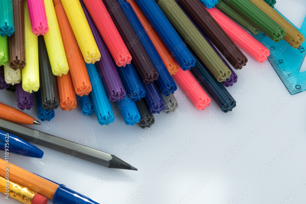 Fototapeta premium colored markers on the white background