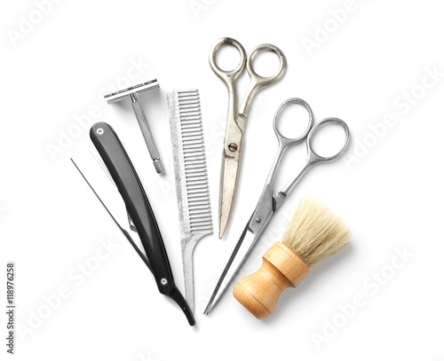 Vintage tools of barber shop on white background