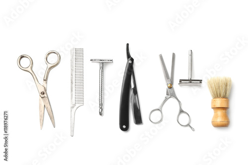 Vintage tools of barber shop on white background