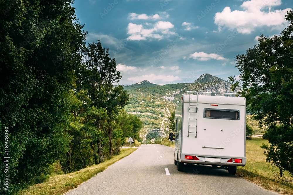 Motorhome Car Goes On Road On Background Of French Mountain Nature Landscape Motorhome Car Goes On Road On Background Of French Mountain Nature Landscape