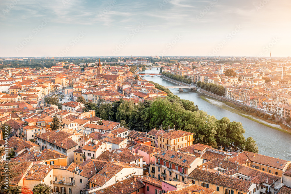 Panoramic aerial view on the eastern part of Verona old town from the castle hill on the sunset