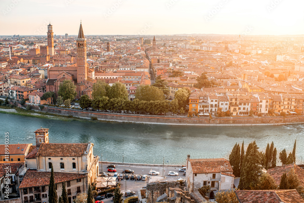 Fototapeta premium Panoramic aerial view on Verona old town from the castle hill on the sunset