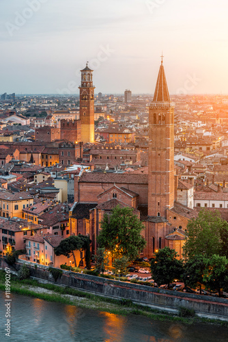 Verona aerial view on illuminated old town on the sunset in Italy