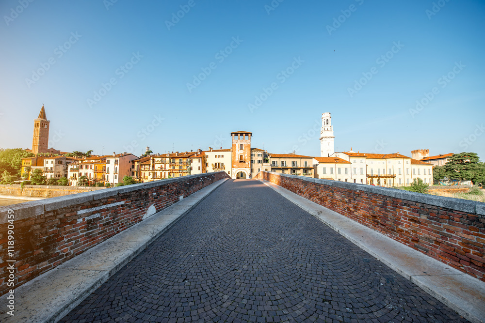 Verona cityscape view on the Stone bridge and watchtower on the sunset