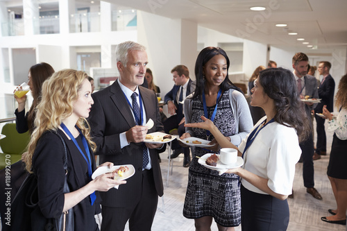 Delegates Networking During Conference Lunch Break