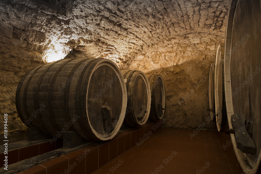 Antique Wine Cellar with Rusty Wooden Barrels