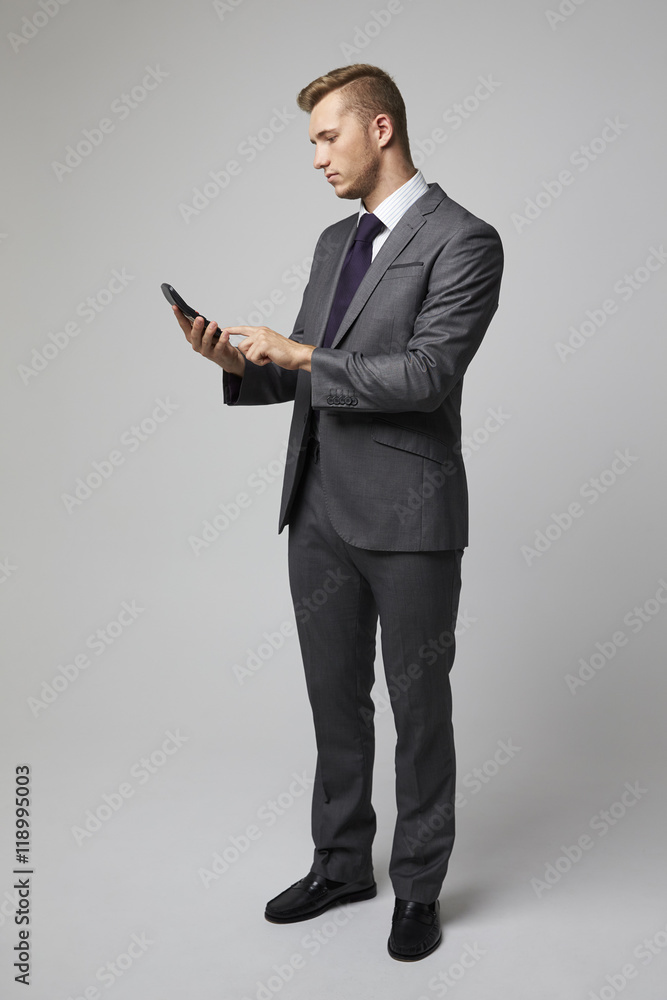 Studio Portrait Of Accountant Using Calculator Studio Portrait Of Accountant Using Calculator