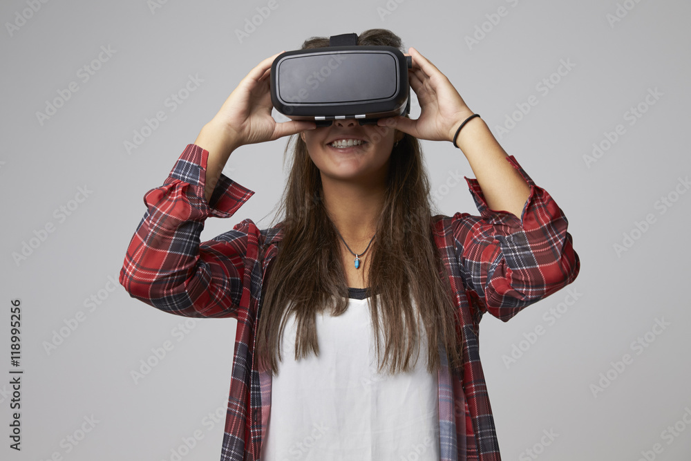 Studio Portrait Of Video Game Designer Wearing VR Headset Studio Portrait Of Video Game Designer Wearing VR Headset