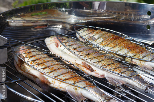 Trouts on charcoal bbq grill