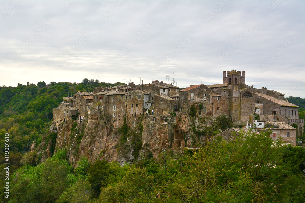 Calcata (Viterbo, Italy) - The old town of Calcata, perched on a mountain of tufa, overlooking the green Treja river valley, in Lazio region.