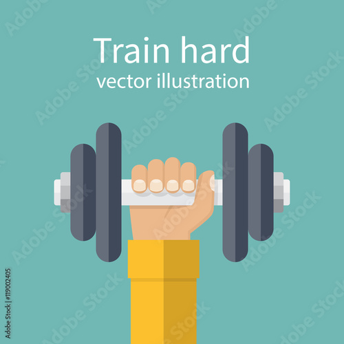 Hand holding dumbbell