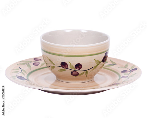 Painted bowl and plate separated on white background