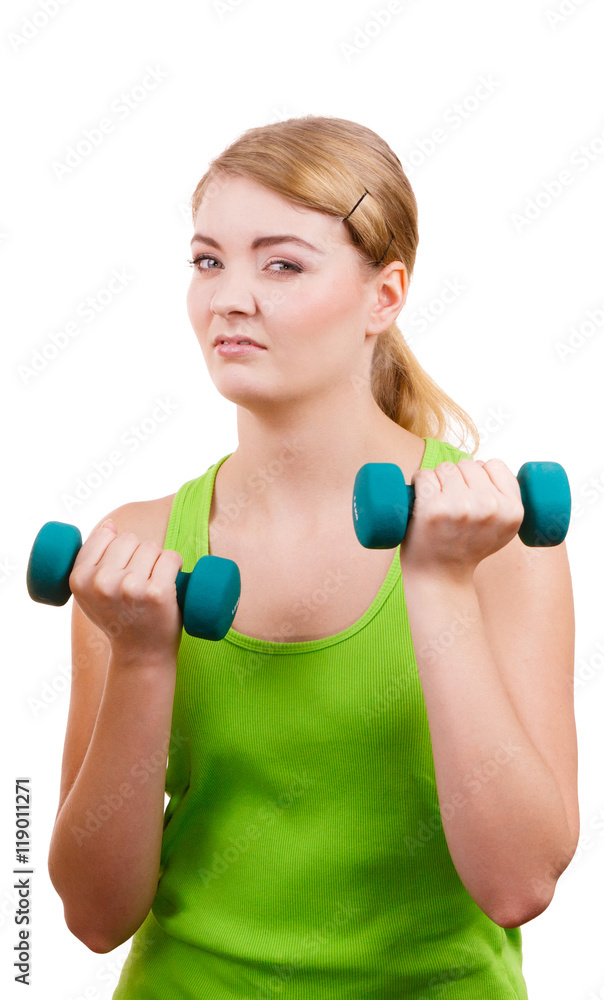 Woman exercising with dumbbells lifting weights Woman exercising with dumbbells lifting weights