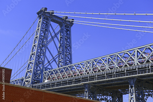 Wiliamsburg Bridge connecting Manhattan and Brooklyn over East River, New York City