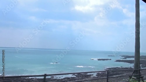 Driving Nichinan Coast.View of straight rows of basalt rock Onino Sentakuita (devil's washboard) in Miyazaki, Japan 