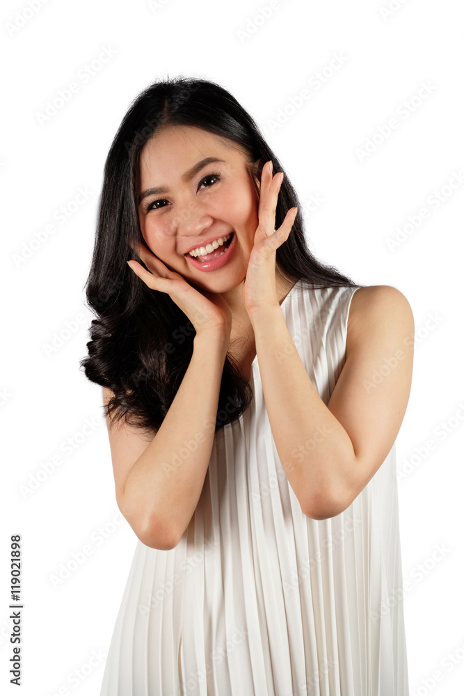 Happy young woman with smiling face wearing white dress looking at camera on white background Happy young woman with smiling face wearing white dress looking at camera on white background
