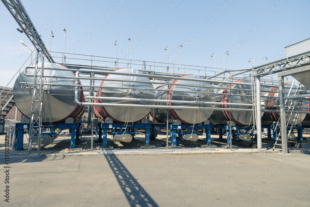 Stainless steel fermenters used to make wine, toned image