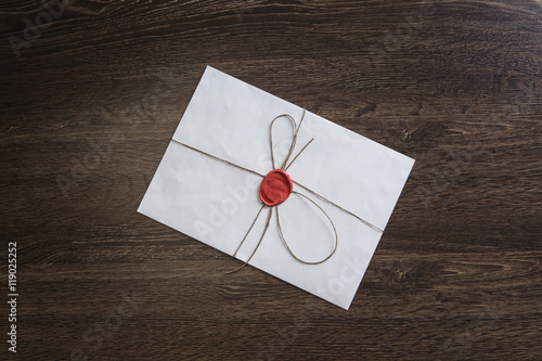 Letter with seal on table