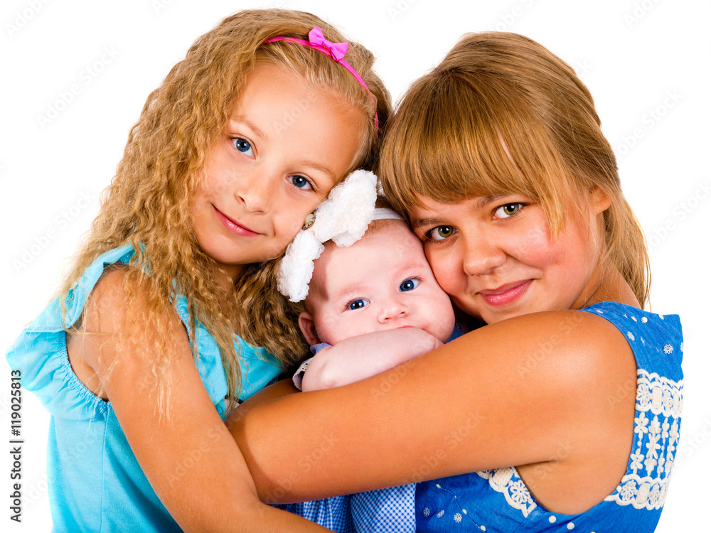 Children. Portrait of three beautiful young girls on a white background Children. Portrait of three beautiful young girls on a white background