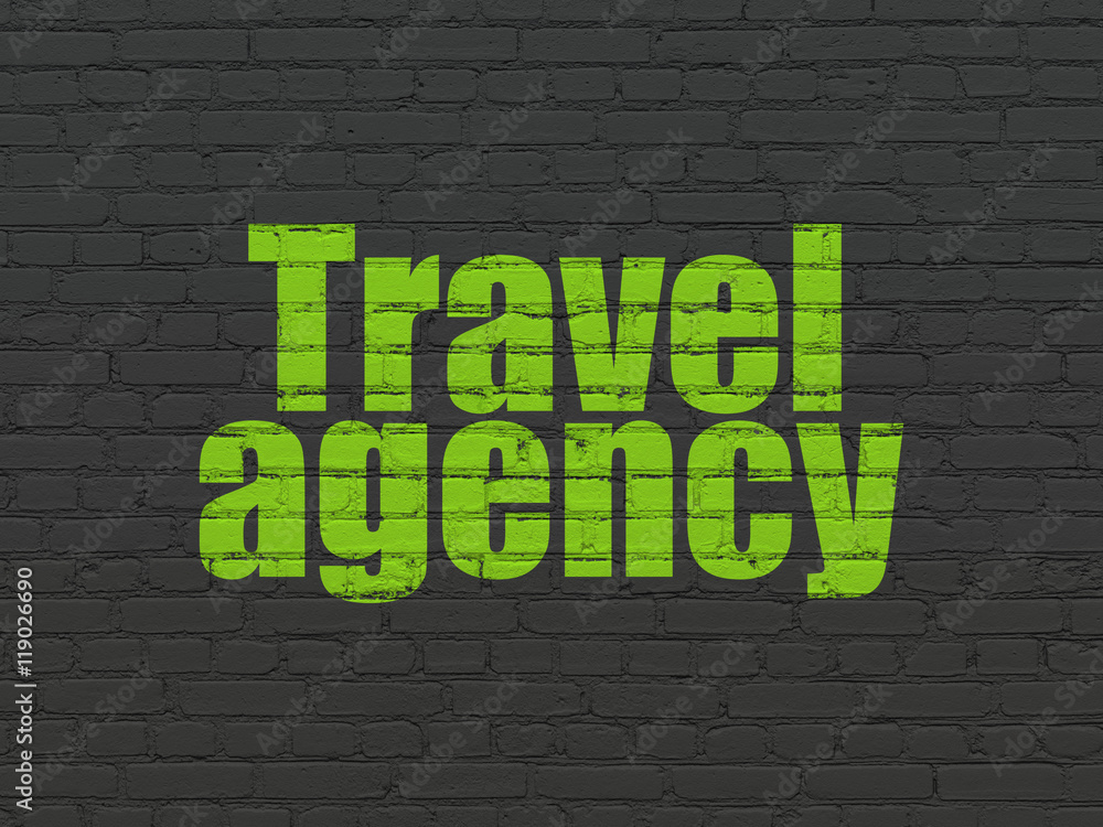 Fototapeta premium Vacation concept: Travel Agency on wall background