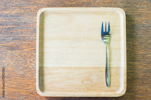 a fork on the wood tray which can put anything on the sided
