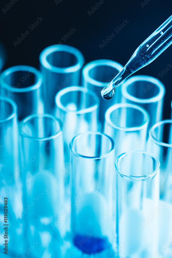 science research concept,Dropping chemical liquid to test tube, science research concept,Dropping chemical liquid to test tube,