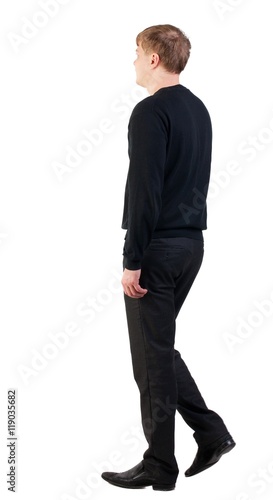 back view of walking  business man. doomed man goes to work. going young guy in red shirt. stylishly dressed in formal wear young man. Isolated over white background. Rear view people collection