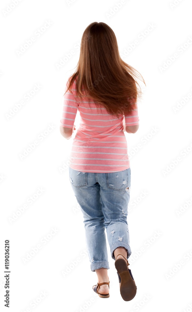 back view of running woman. beautiful redhead girl in motion. backside view of person. Rear view people collection. Isolated over white background. back view of running woman. beautiful redhead girl in motion. backside view of person. Rear view people collection. Isolated over white background.