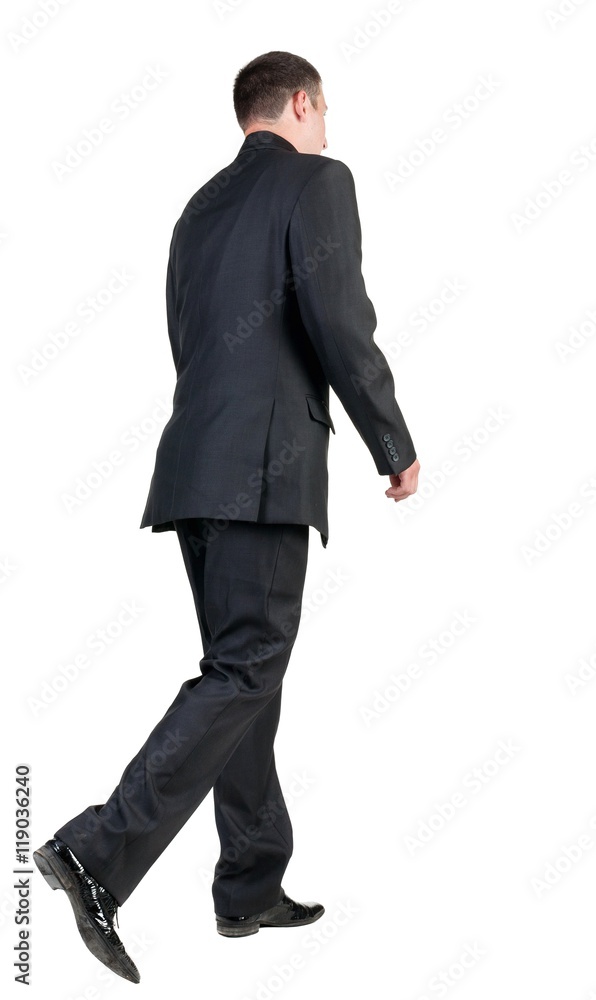 back view of walking business man. going young guy in black suit. Isolated over white background. Rear view people collection. backside view of person. back view of walking business man. going young guy in black suit. Isolated over white background. Rear view people collection. backside view of person.