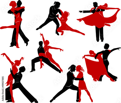 Silhouettes of the pairs dancing ballroom dances. 