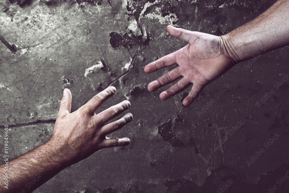 2 Hände greifen nach einander StockFoto Adobe Stock