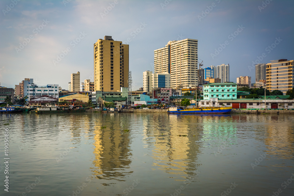 Buildings along the Pasig River, seen from Fort Santiago, in Int
