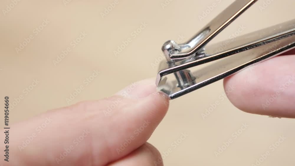 Nail clipper close-up taking care of nails and hands hygiene 4K 3840X2160 UltraHD video - Trimming fingernails with nail trimm shallow DOF 4K 2160p 30fps UHD footage Nail clipper close-up taking care of nails and hands hygiene 4K 3840X2160 UltraHD video - Trimming fingernails with nail trimm shallow DOF 4K 2160p 30fps UHD footage