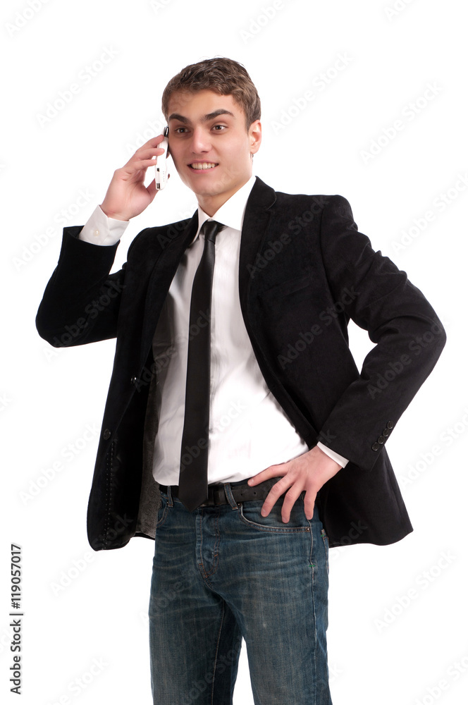 Young happy man holding mobile phone