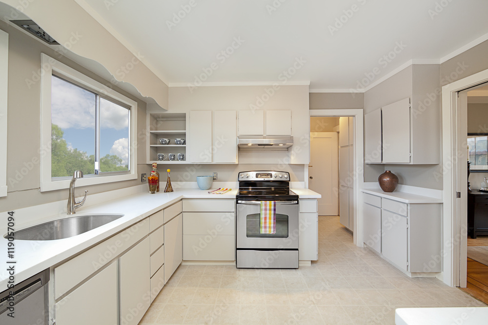 Modern White Kitchen with Tile Floor Modern White Kitchen with Tile Floor