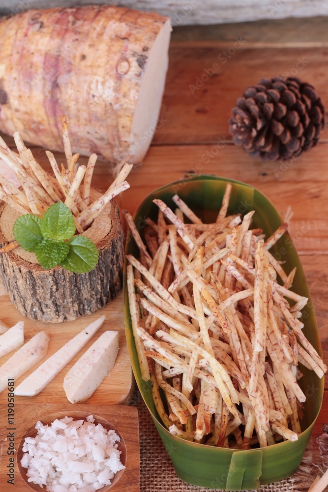 Fresh taro and taro stick with salt.