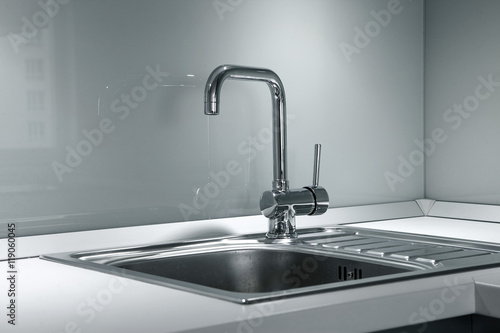 faucet and sink in the kitchen